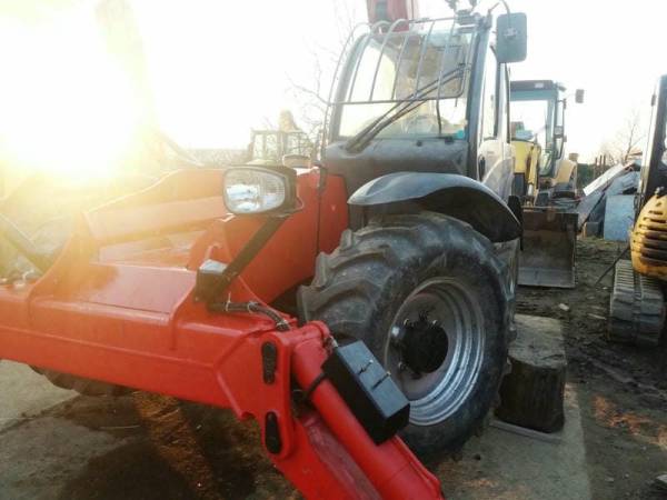 Телескопічний навантажувач Manitou MT1440 (2012)