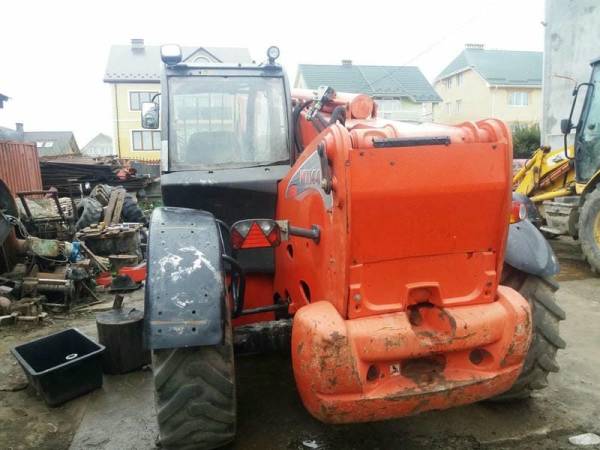 Телескопічний навантажувач Manitou MT1440 (2012)