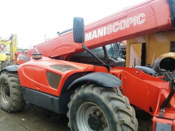Телескопічний навантажувач Manitou MT1440 (2012)