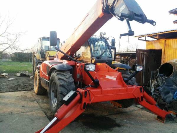 Телескопічний навантажувач Manitou MT1440 (2012)