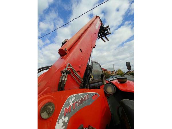 Телескопічний навантажувач Manitou MT1440 (2012)
