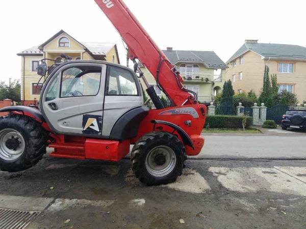 Телескопічний навантажувач Manitou MT1440 (2012)