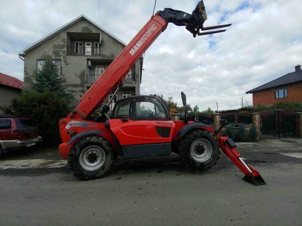 Телескопічний навантажувач Manitou MT1440 (2012)