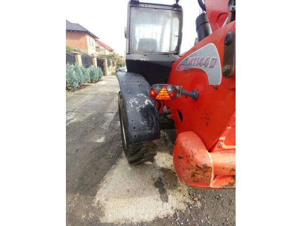 Телескопічний навантажувач Manitou MT1440 (2012)