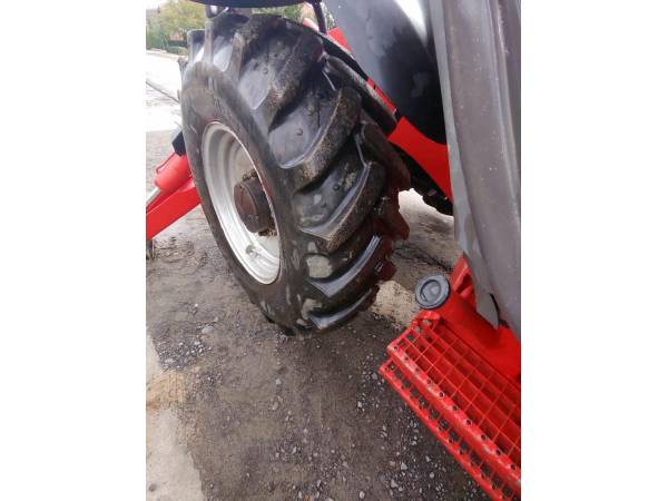 Телескопічний навантажувач Manitou MT1440 (2012)