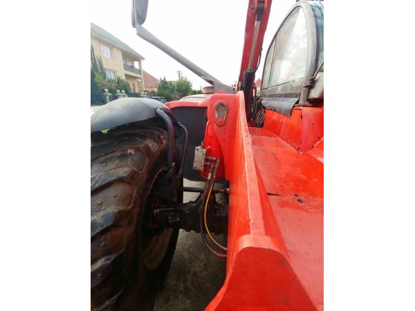 Телескопічний навантажувач Manitou MT1440 (2012)