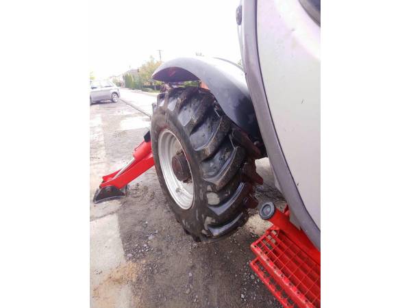 Телескопічний навантажувач Manitou MT1440 (2012)