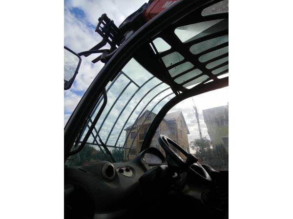 Телескопічний навантажувач Manitou MT1440 (2012)