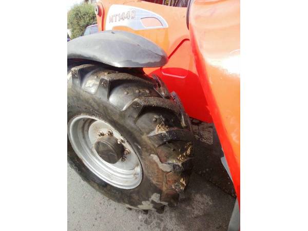 Телескопічний навантажувач Manitou MT1440 (2012)