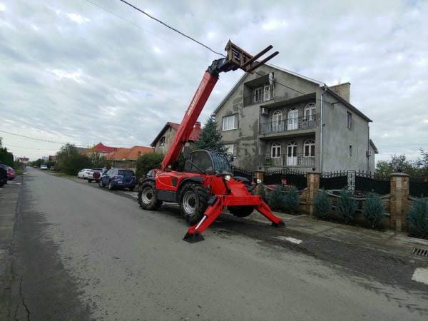Телескопічний навантажувач Manitou MT1440 (2012)