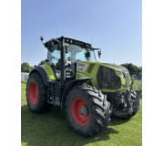 Трактор Claas Axion 810