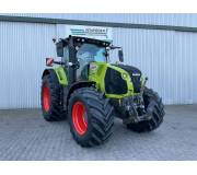 Трактор Claas Axion 810