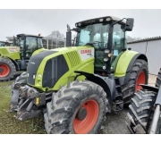 Трактор Claas Axion 810