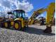 Екскаватор-навантажувач Komatsu WB93S (2007)