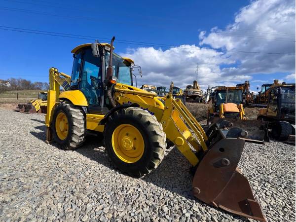 Екскаватор-навантажувач Komatsu WB93S (2007)