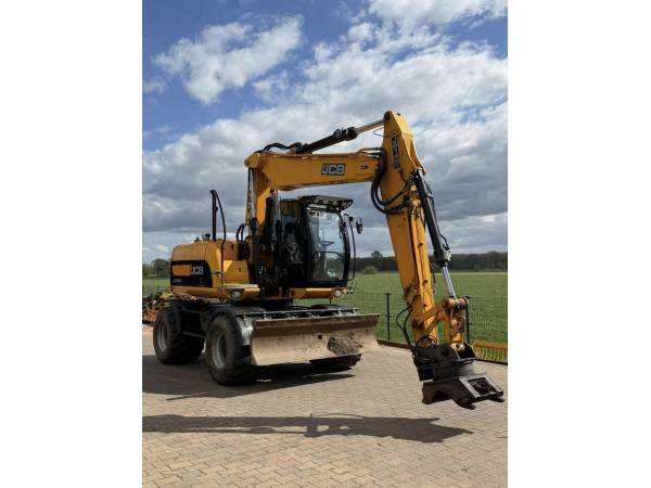Екскаватор-навантажувач JCB JS145W (2008)