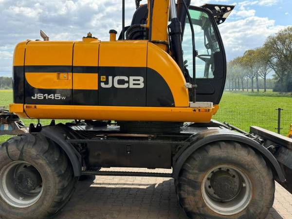 Екскаватор-навантажувач JCB JS145W (2008)