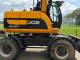 Екскаватор-навантажувач JCB JS145W (2008)