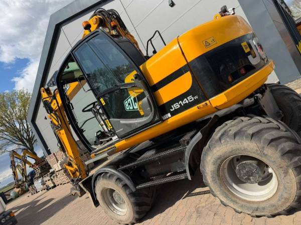 Екскаватор-навантажувач JCB JS145W (2008)