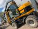 Екскаватор-навантажувач JCB JS145W (2008)