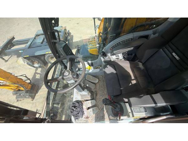 Екскаватор-навантажувач JCB JS145W (2008)