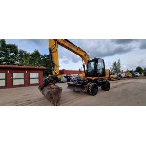 Екскаватор-навантажувач JCB JS145W (2010)