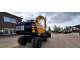 Екскаватор-навантажувач JCB JS145W (2010)