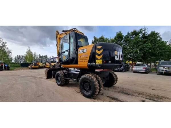 Екскаватор-навантажувач JCB JS145W (2010)