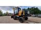 Екскаватор-навантажувач JCB JS145W (2010)