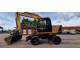 Екскаватор-навантажувач JCB JS145W (2010)