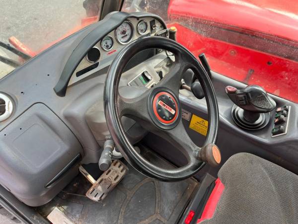 Телескопічний навантажувач Manitou MLT 731 LSU (2009)