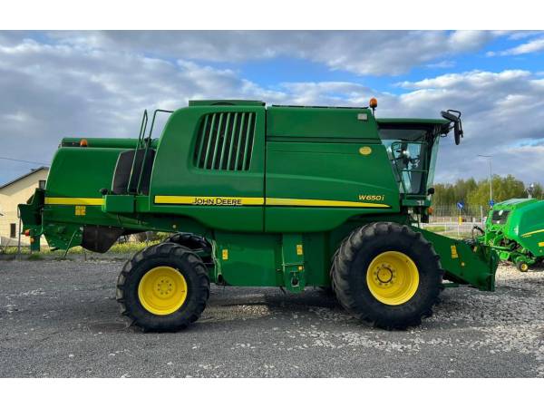 Комбайн John Deere W650i (2009)