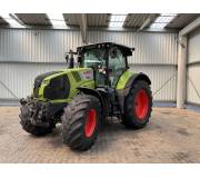 Трактор Claas Axion 810