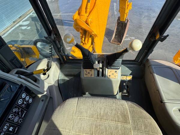 Экскаватор-погрузчик JCB 4CX (1995)