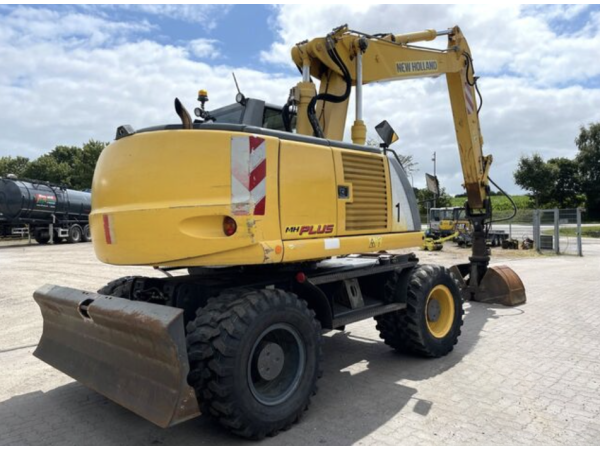 Экскаватор New Holland MH Plus (2005)