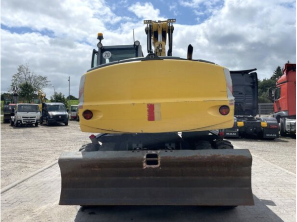 Экскаватор New Holland MH Plus (2005)