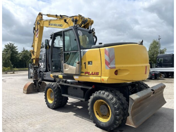 Экскаватор New Holland MH Plus (2005)
