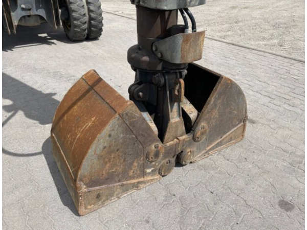 Экскаватор New Holland MH Plus (2005)