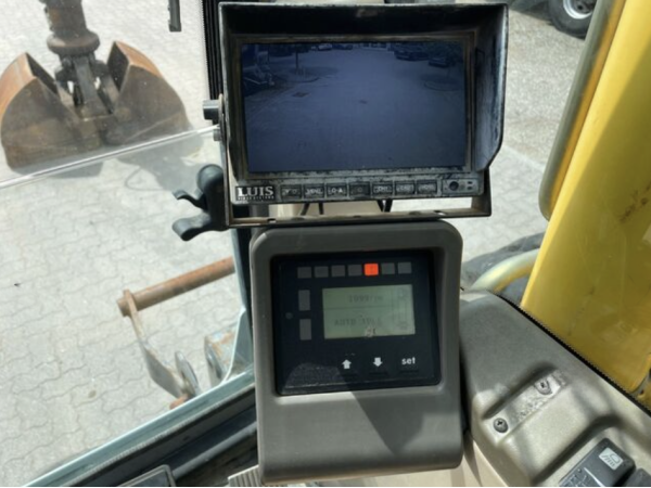 Экскаватор New Holland MH Plus (2005)