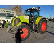 Трактор Claas Axion 810