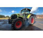 Трактор Claas Axion 810
