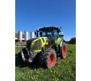 Трактор Claas Axion 810