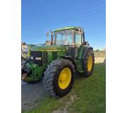 Трактор John Deere 6910