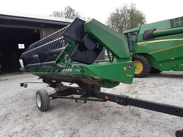 Комбайн John Deere W330 (2014)