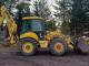 Екскаватор New Holland LB115 (2002)