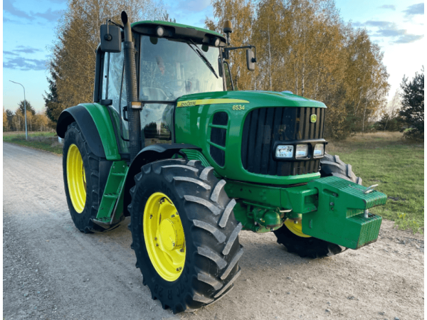Трактор John Deere 6534 (2012)