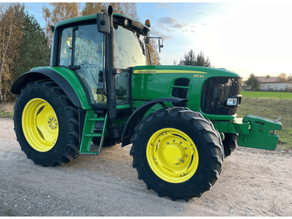 Трактор John Deere 6534 (2012)