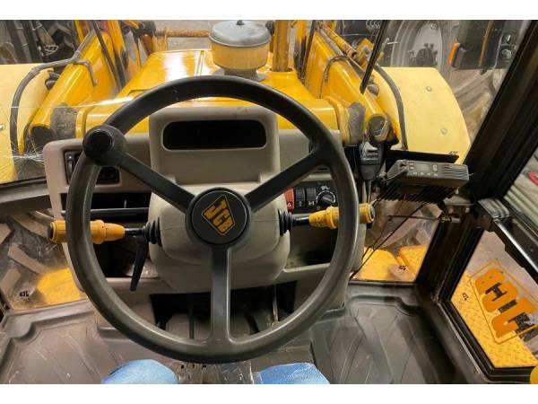 Екскаватор-навантажувач JCB 4CX (1999)