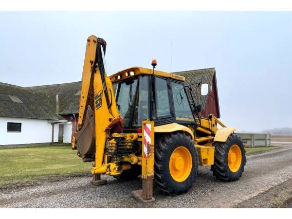 Екскаватор-навантажувач JCB 4CX (1999)