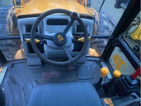 Екскаватор-навантажувач JCB 4CX (2000)